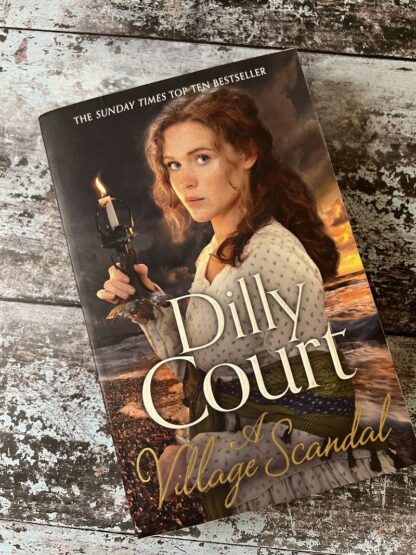 An image of a book by Dilly Court - A Village Scandal