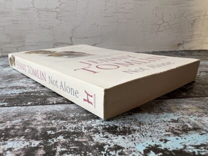 An image of a book by Jenny Tomlin - Not Alone