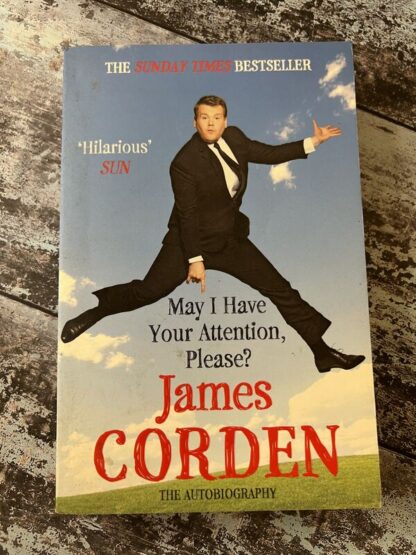 An image of a book by James Corden - May I have your attention please?