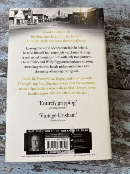 An image of a book by John Grisham - The Litigators