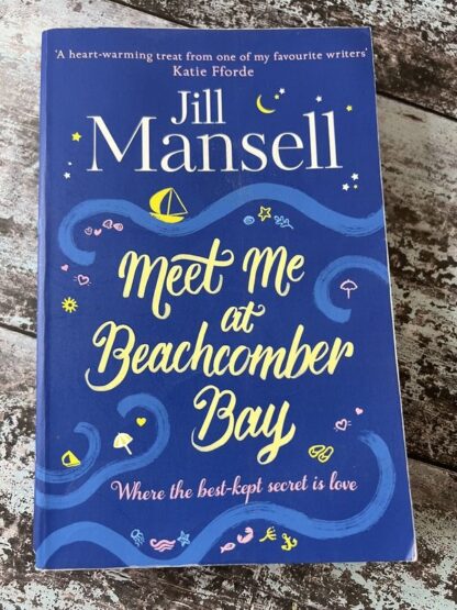 An image of a book by Jill Mansell - Meet Me at Beachcomber Bay