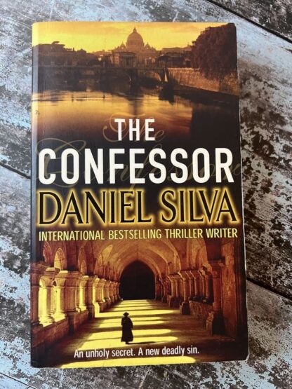 An image of a book by Daniel Silva - The Confessor