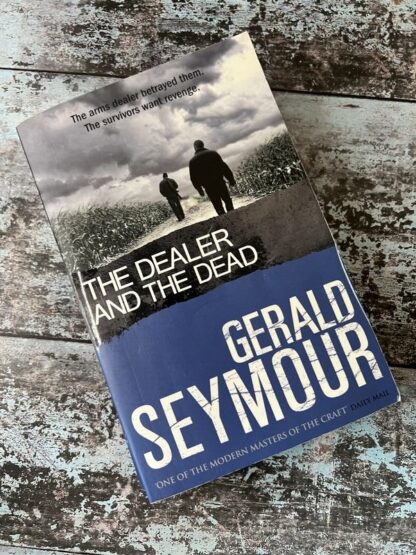 An image of a book by Gerald Seymour - The Dealer and the Dead