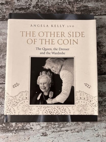 An image of a book by Angela Kelly - The Other Side of the Coin