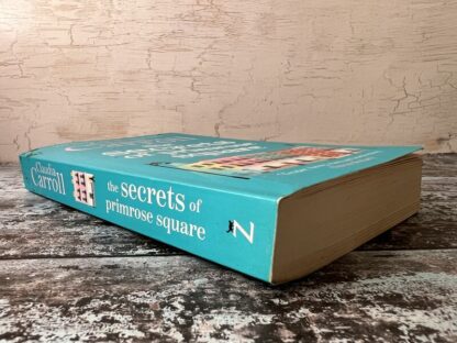 An image of the book The Secrets of Primrose Square by Claudia Carroll