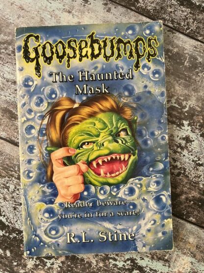 An image of the book Goosebumps. The Haunted Mask by RL Stine