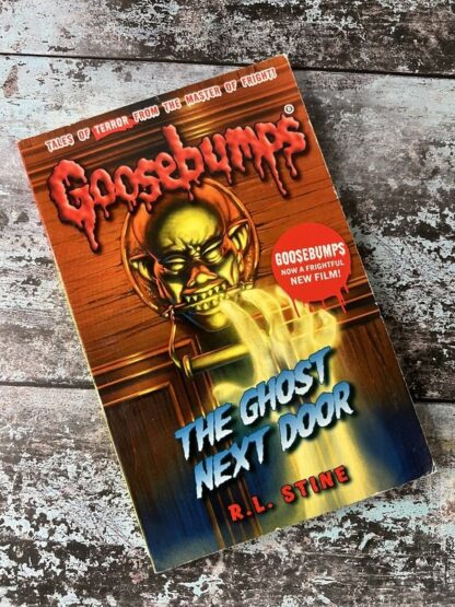 An image of the book Goosebumps. The Ghost Next Door by RL Stine