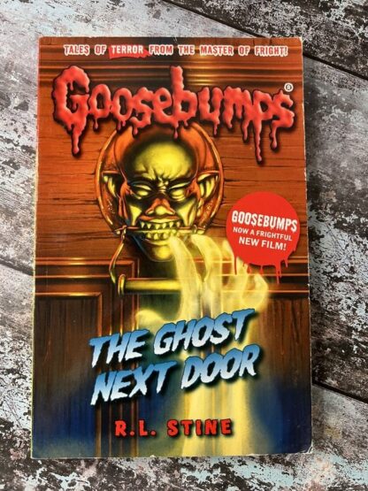 An image of the book Goosebumps. The Ghost Next Door by RL Stine