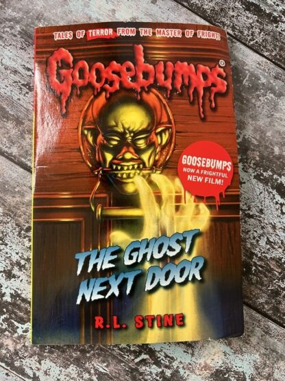 An image of the book Goosebumps. The Ghost Next Door by RL Stine