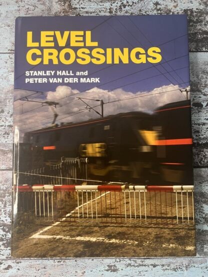 An image of the book Level Crossings: The History, Development and Safety Record of Railway Level Crossings in Britain and Overseas from 1830 to 2008 by Stanley Hall and Peter Van Der Mark