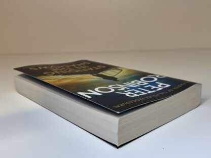 An image of the book Standing in the Shadows by Peter Robinson