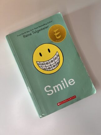 An image of the book Smile by Raina Telgemeier