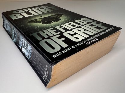 An image of the book The Fields of Grief by Giles Blunt